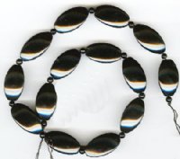 16 inch strand of 25mm Three Sided Black Onyx Ovals